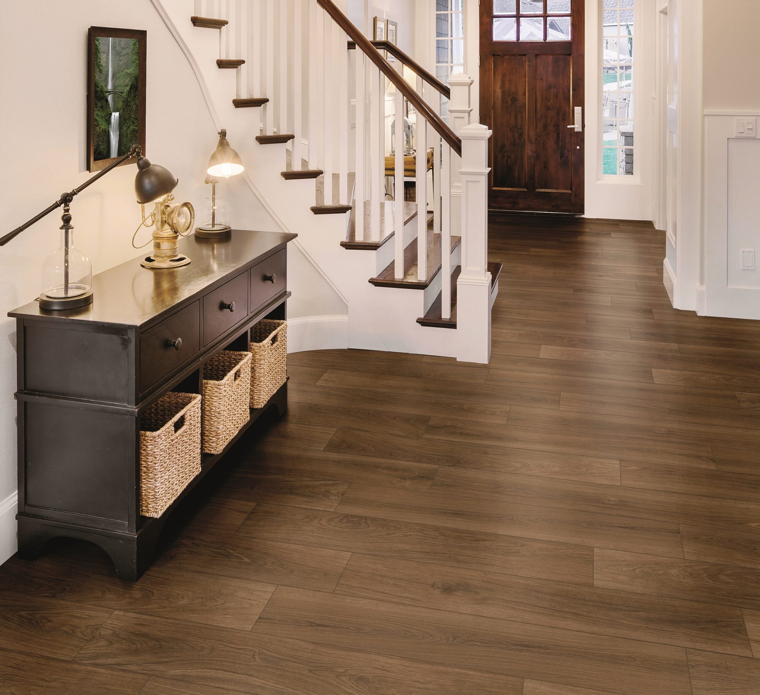 Porcelain wood look tile installed in a foyer.