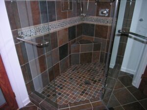 how to make a small shower look bigger with tiling