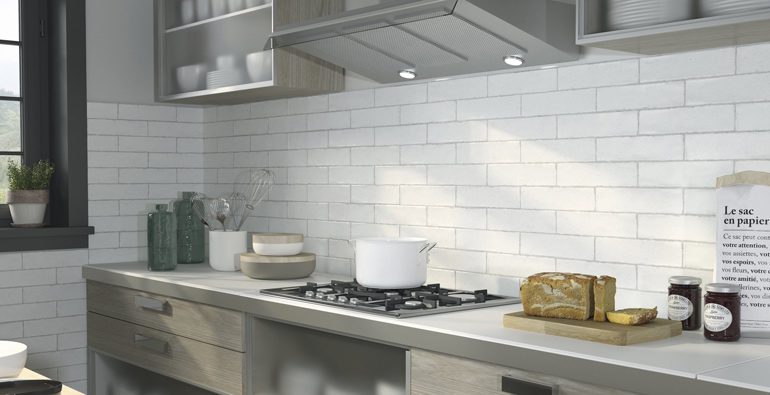 APE Group Altea color Armen White 3x12 wall tile installed on a kitchen backsplash
