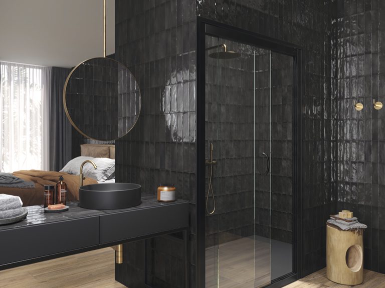 Ape Seville Black installed on bathroom walls.