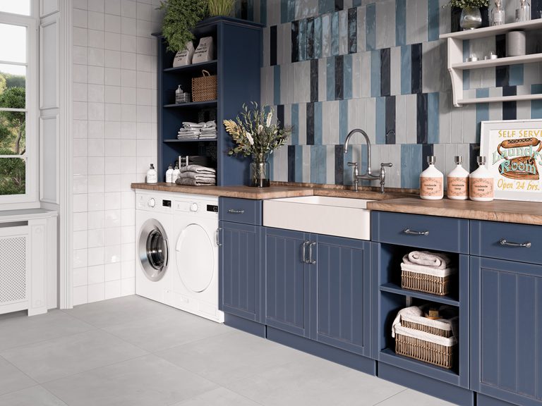 Florida Tile Songbird Quill Grey, Birds Eye Blue, and Nocturnal Navy on Laundry Room Walls and NY 2 LA Malibu White on floor.