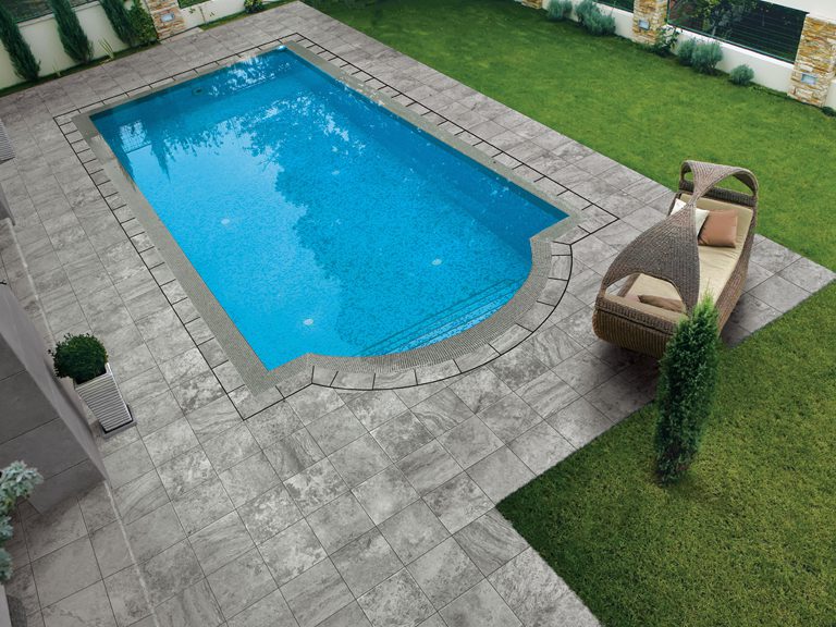 Kronos USA Cross Cut Andes 2cm installed around a pool. Photo courtesy of Kronos USA.