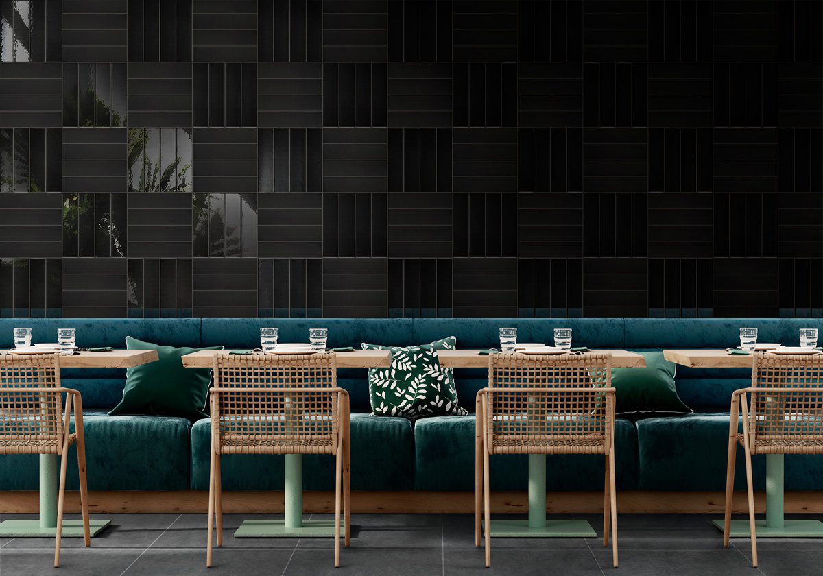 A restaurant or amenity space with tables and chairs and Florida Tile Fluent installed on the wall.