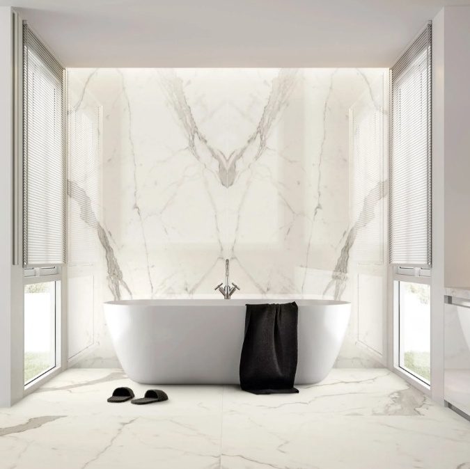 A luxurious bathroom with a white bathtub.
